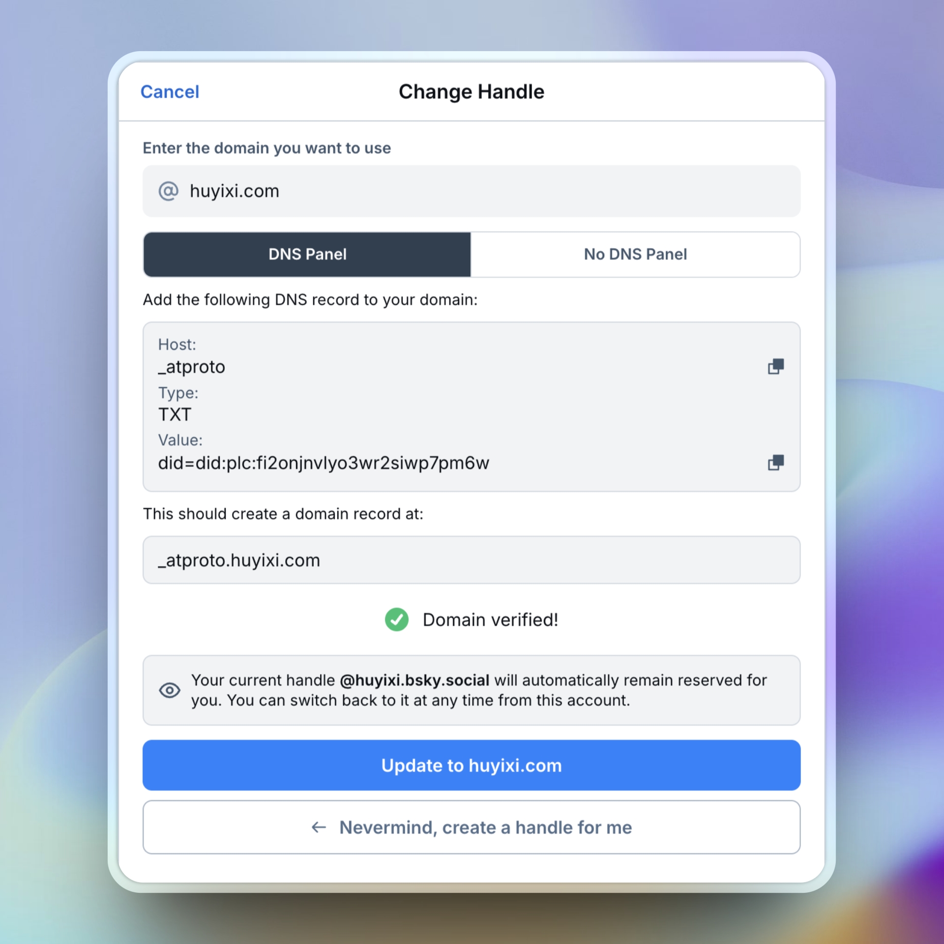 Bluesky Change Handle screen confirming a TXT record for huyixi.com